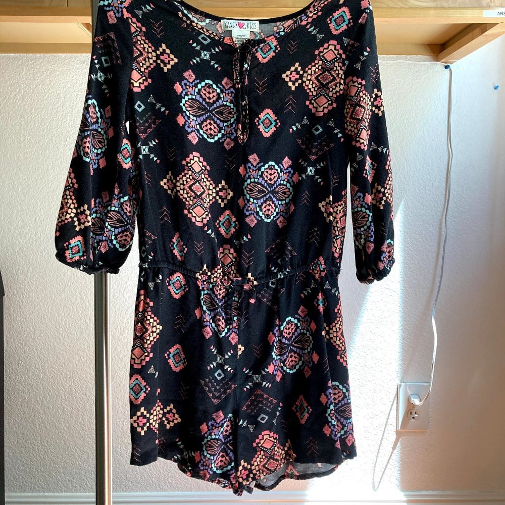 Black and light pink patterned romper